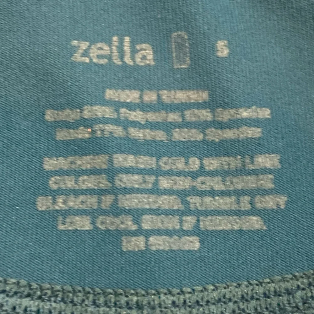 Zella zip up teal ruched athletic jacket with zip up pockets & ruffle back small